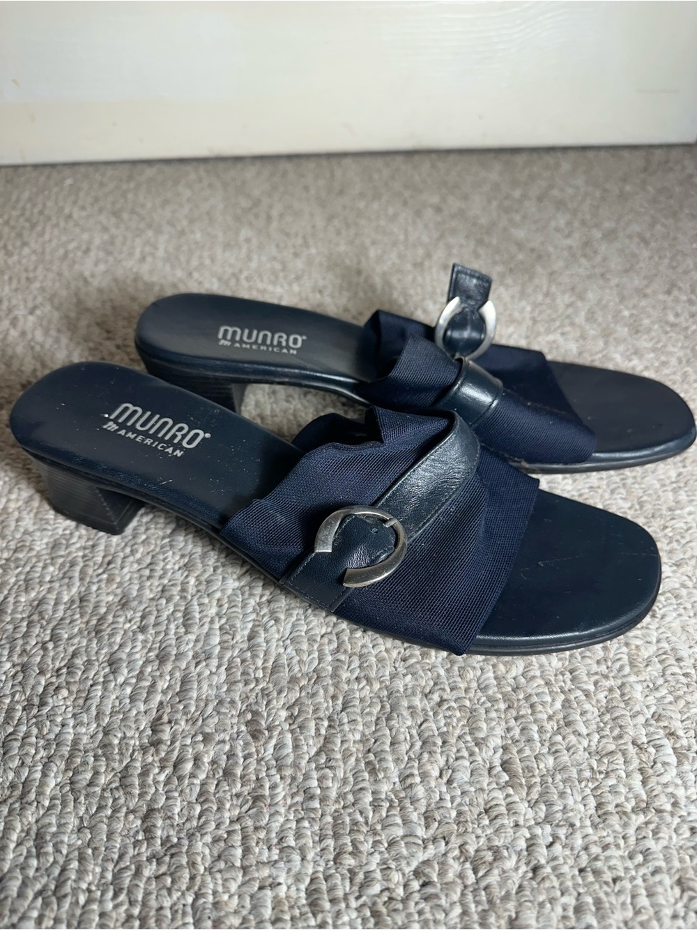 Munro Navy Slide Loafers with Silver Ring Accent